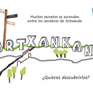 Cartel del escape room exterior Artxankana. El texto dice: "Muchos senderos se esconden entre los senderos de Artxanda ¿Quieres descubrirlos?"